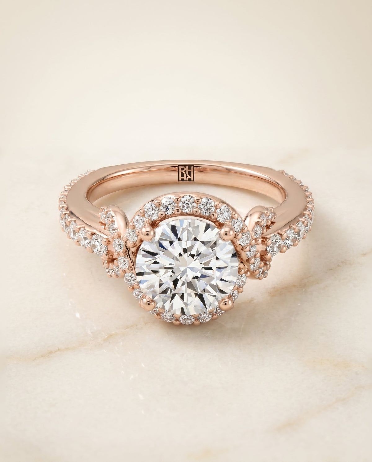 Bess Select Love Knot Pavé Halo Round Lab Diamond Engagement Ring in 14K Rose Gold, alternate angle | RockHer