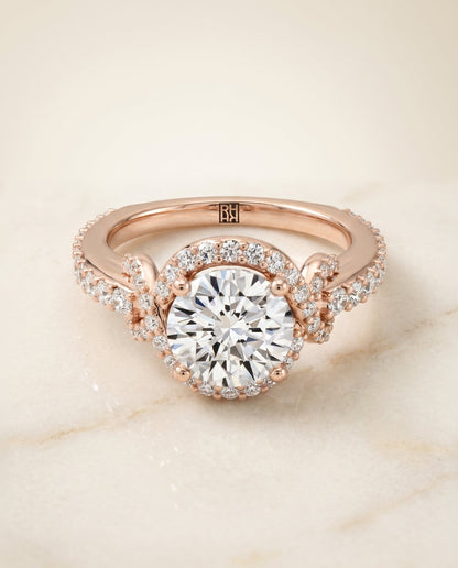 Bess Select Love Knot Pavé Halo Round Lab Diamond Engagement Ring in 14K Rose Gold, alternate angle | RockHer
