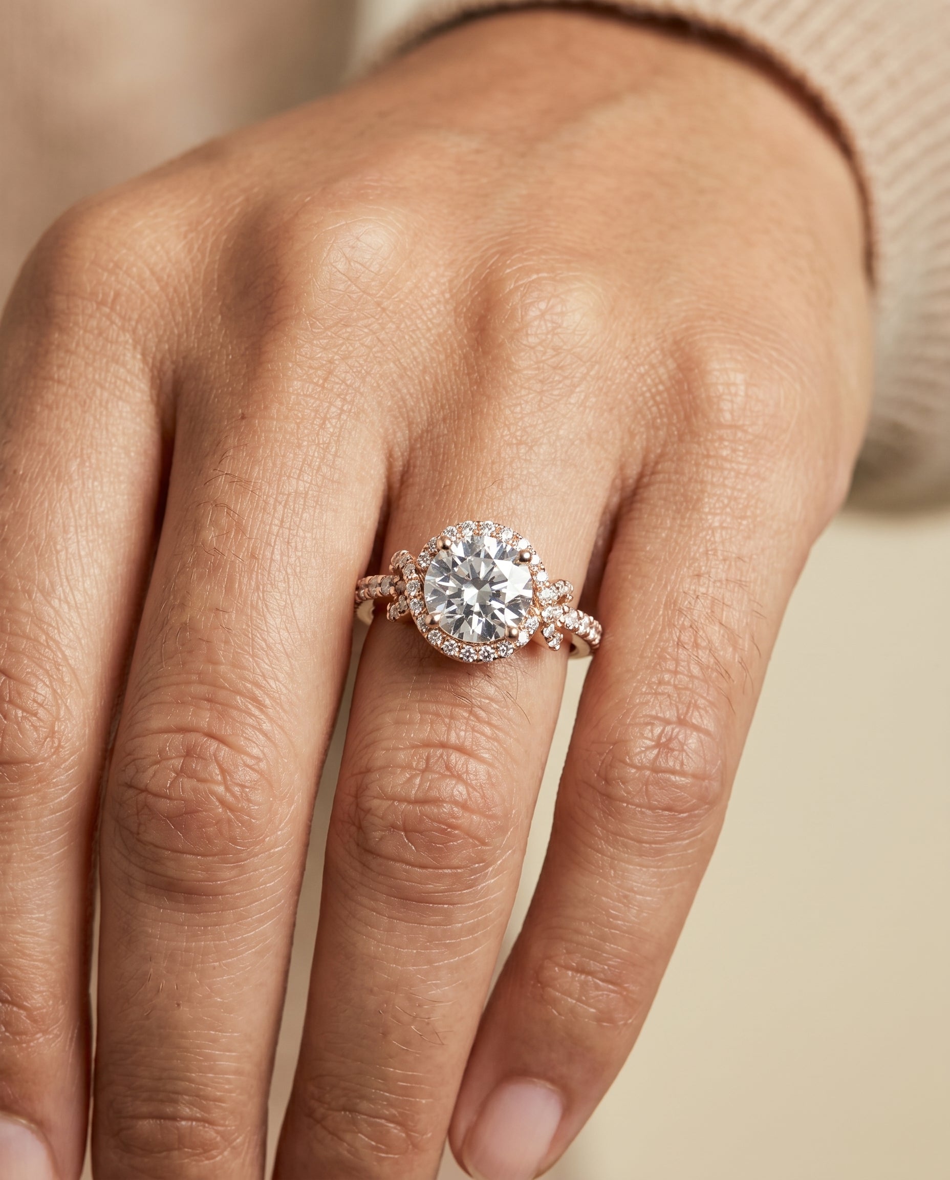 The Bess engagement ring setting in 14K Rose Gold, love knot pavé halo design | RockHer