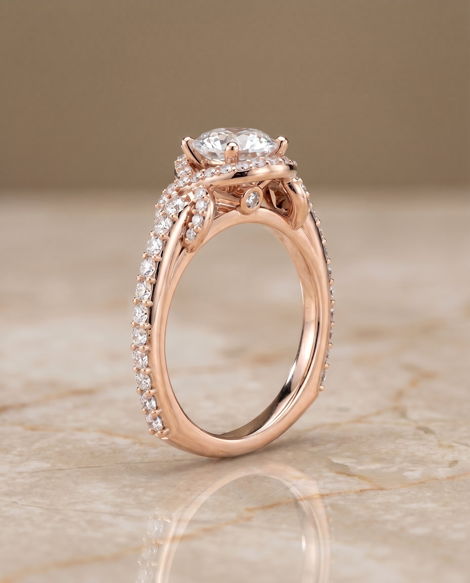 The Bess love knot pavé halo engagement ring setting, shown in 14K Rose Gold | RockHer