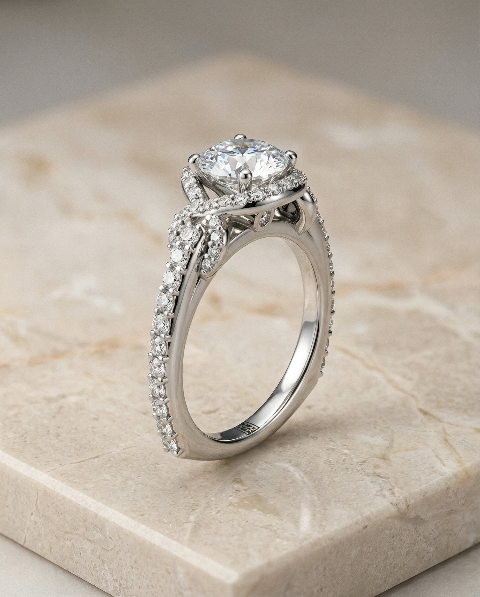 The Bess love knot pavé halo engagement ring setting, shown in Platinum | RockHer