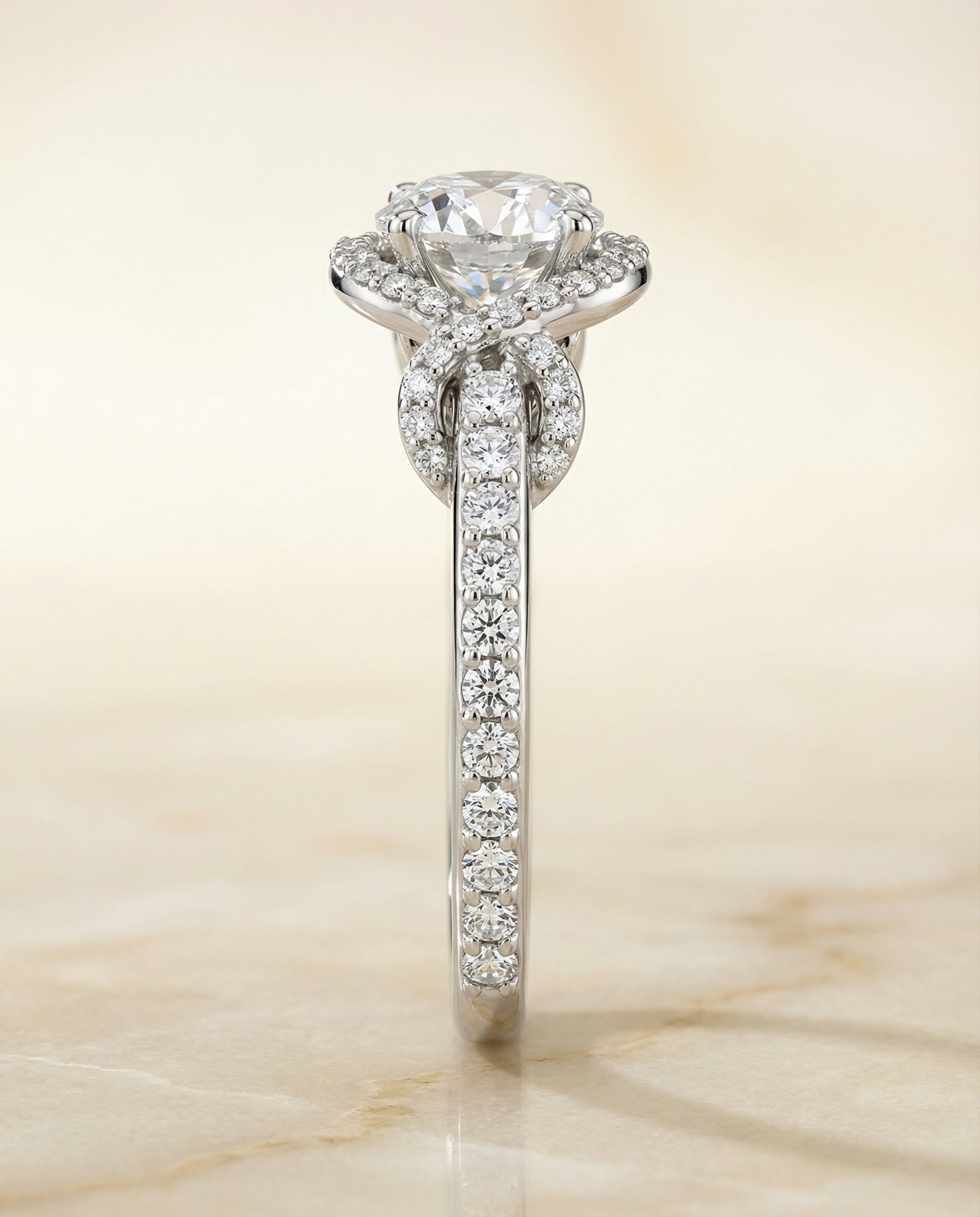 Select Love Knot Pavé Halo styling on The Bess round engagement ring setting | RockHer