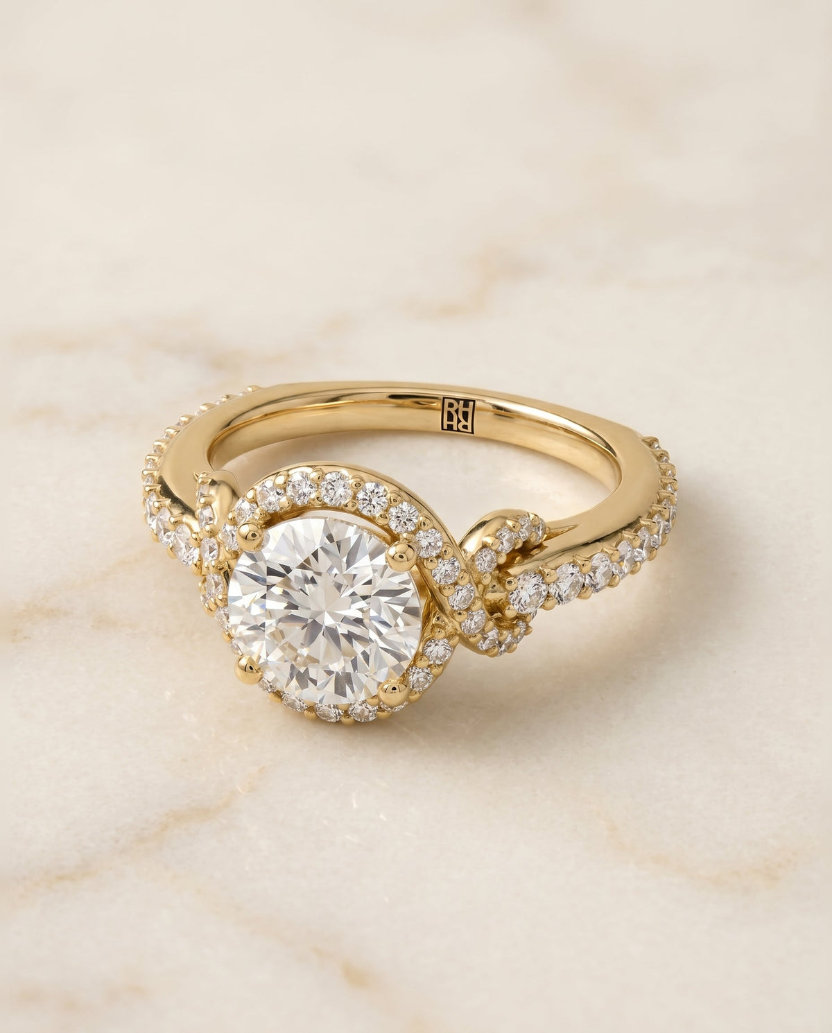 Bess Select Love Knot Pavé Halo Round Lab Diamond Engagement Ring in 18K Yellow Gold, alternate angle | RockHer