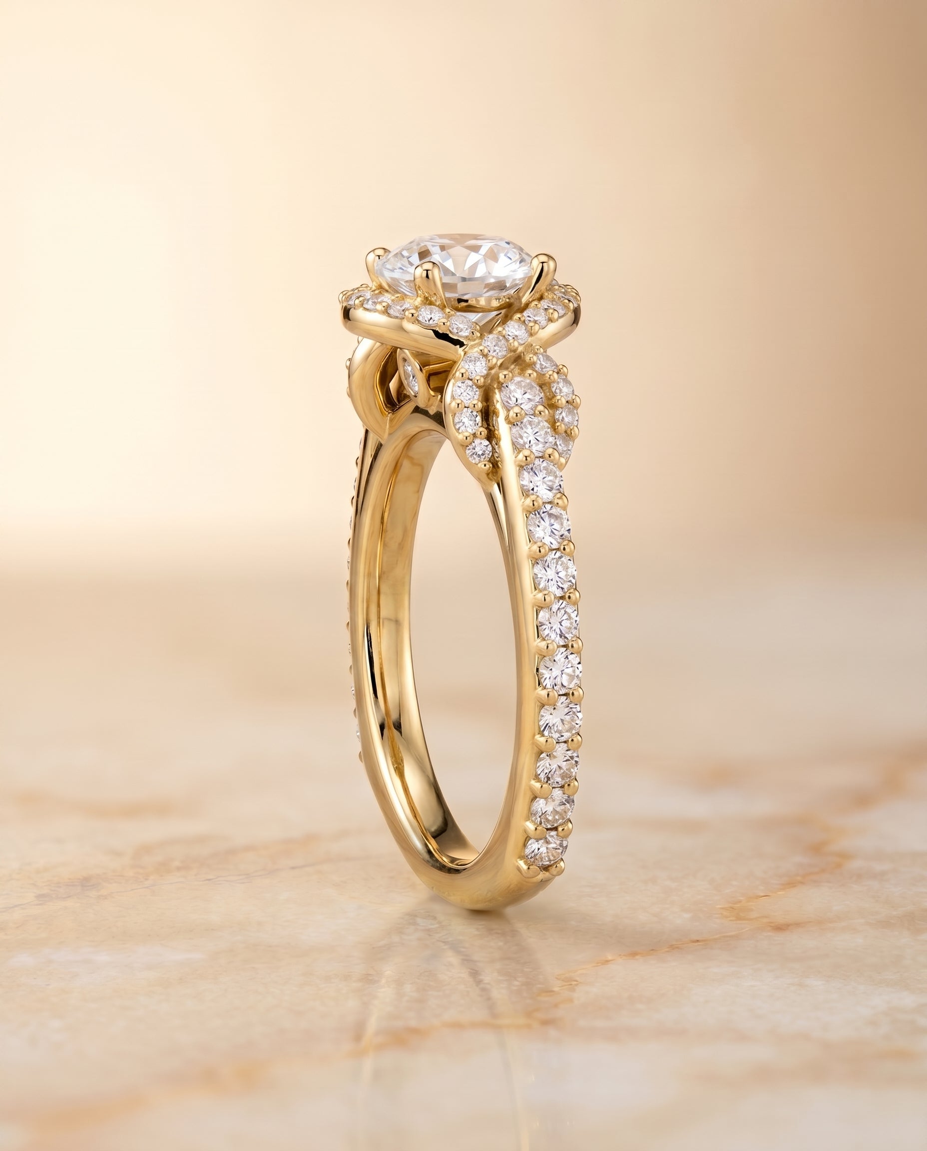 The Bess love knot pavé halo engagement ring setting, shown in 18K Yellow Gold | RockHer