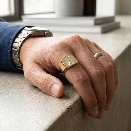 Men's Cushion lab-grown diamond letter signet ring in 14K Yellow Gold, letter E, worn on hand
