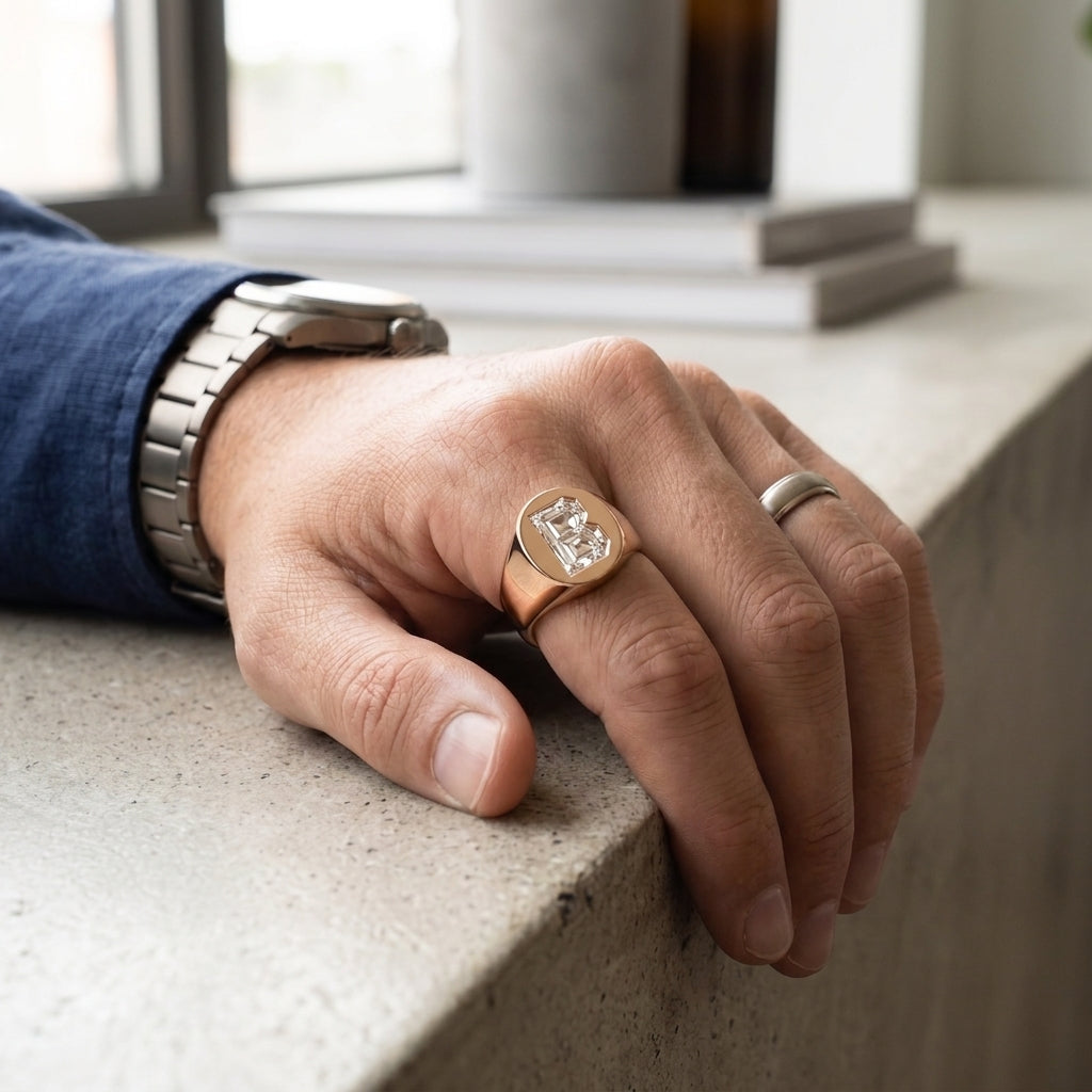 Men's Oval lab-grown diamond letter signet ring in 14K Rose Gold, worn on hand