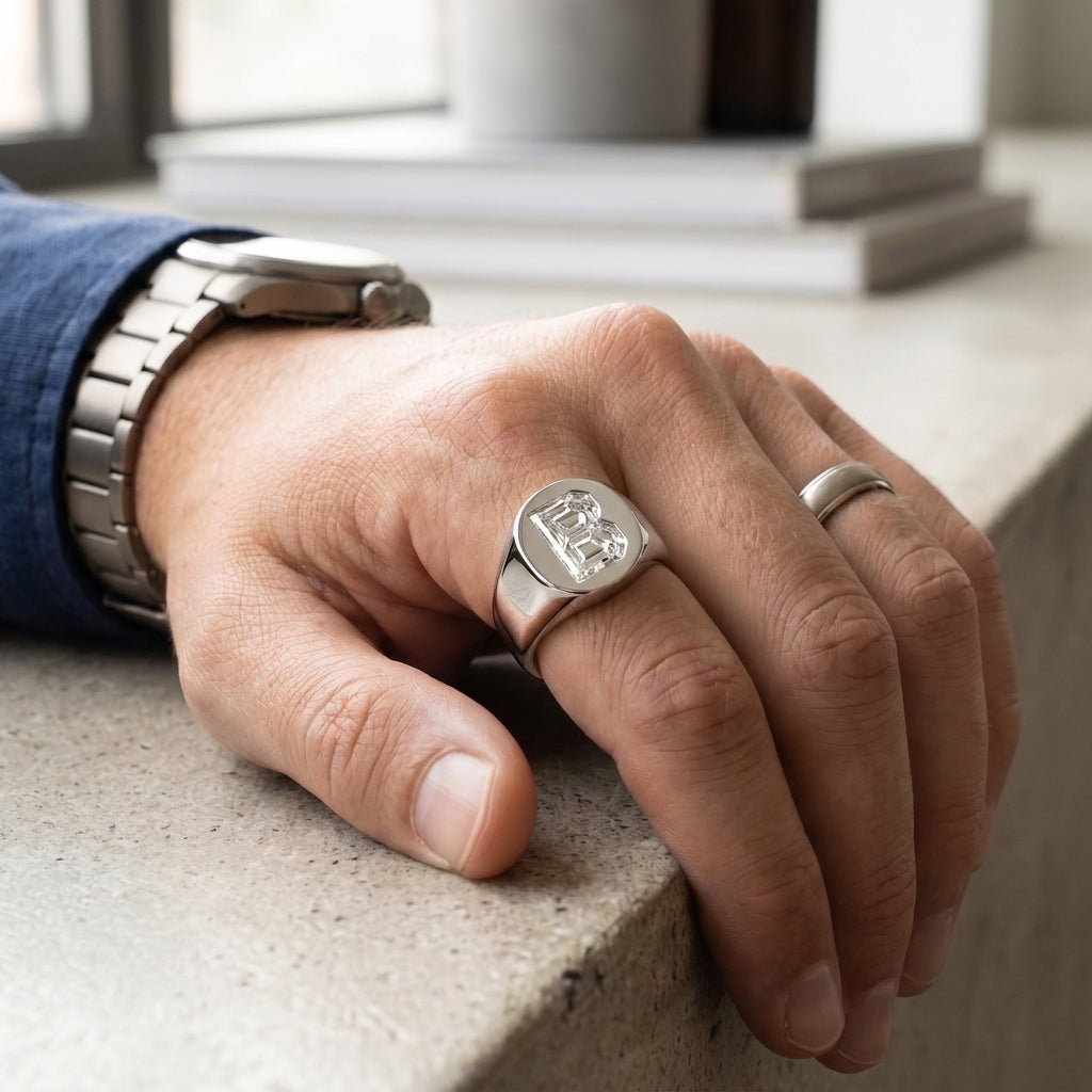 Men's Oval lab-grown diamond letter signet ring in Platinum, worn on hand