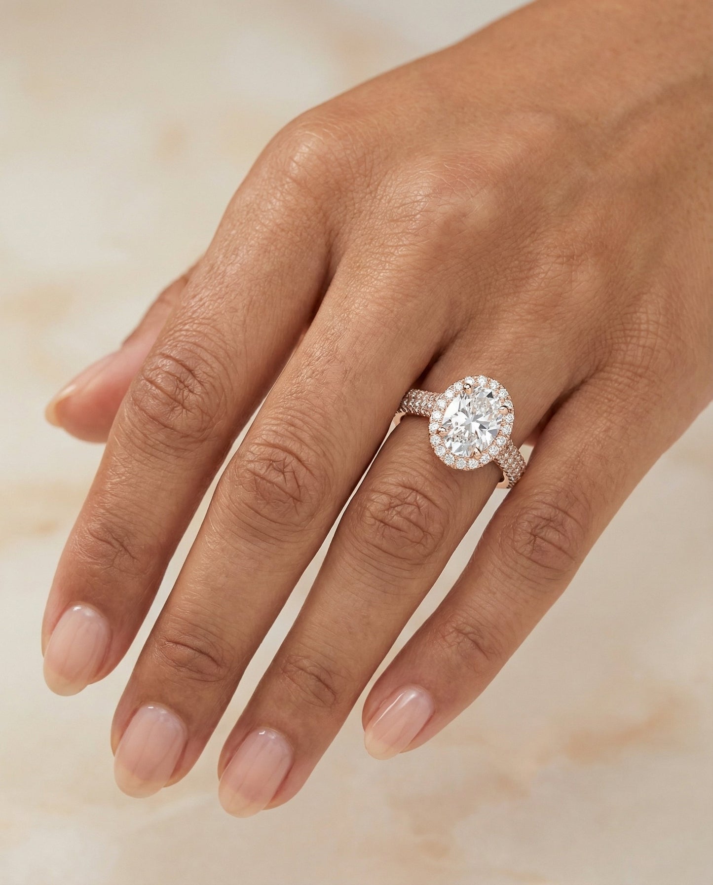 Ella Select micro-pavé triple row halo oval oval ring in 14K Rose Gold — front — RockHer