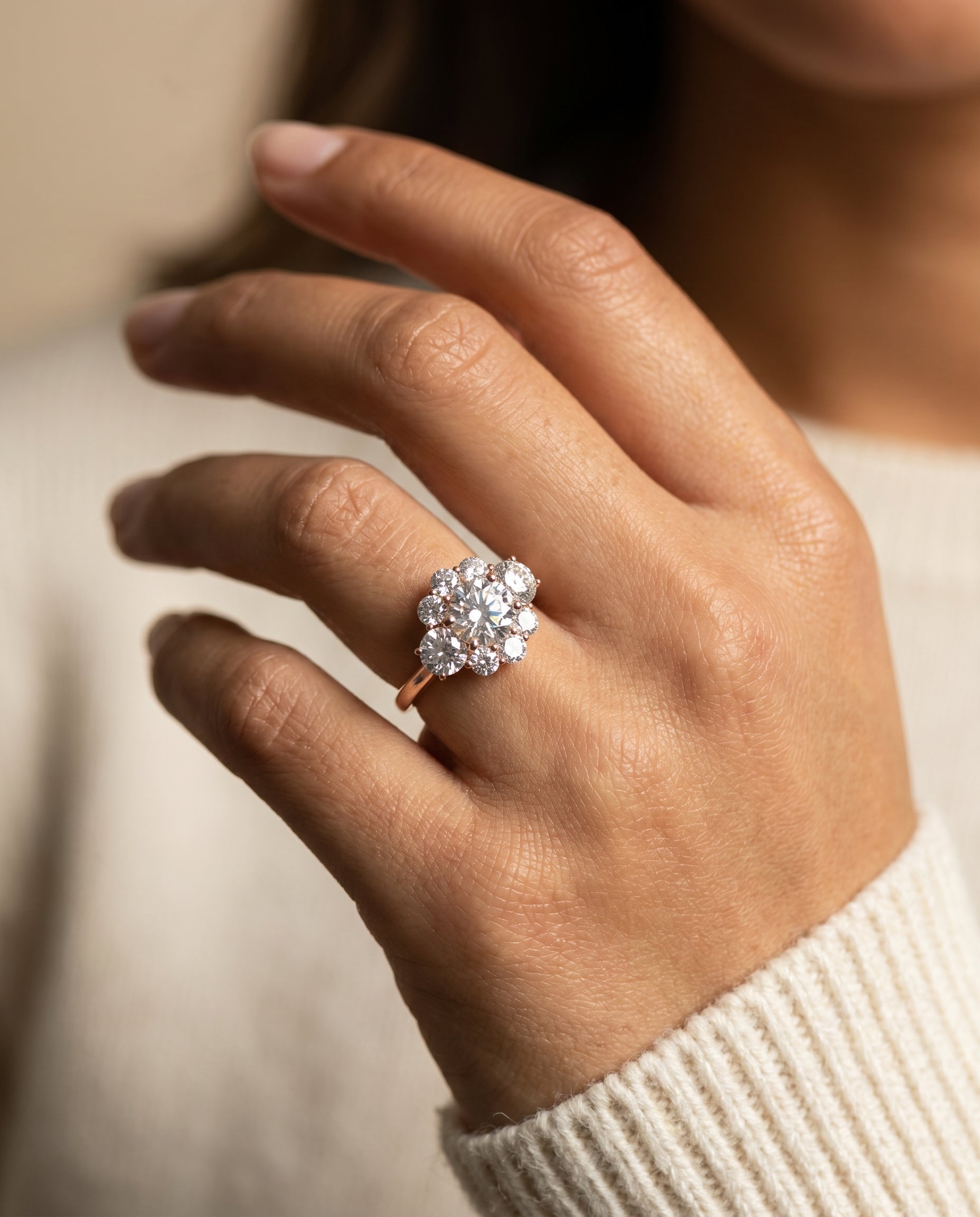 Pamina Select Cluster Halo Round Lab Diamond Engagement Ring in 14K Rose Gold, shown on hand, angled | RockHer