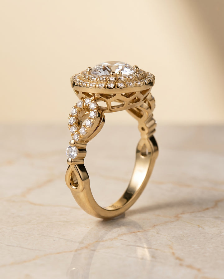 The Calypso Pavé Halo Engagement Ring Setting for Round Diamonds in 18K Yellow Gold