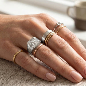 Women's Pavé Border lab-grown diamond letter signet ring in Platinum, letter M, worn on hand