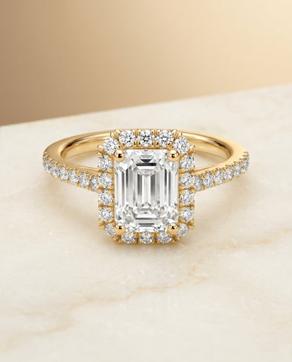 The Dylan Pavé Halo Engagement Ring Setting for Emerald Cut Diamonds in 18K Yellow Gold | RockHer