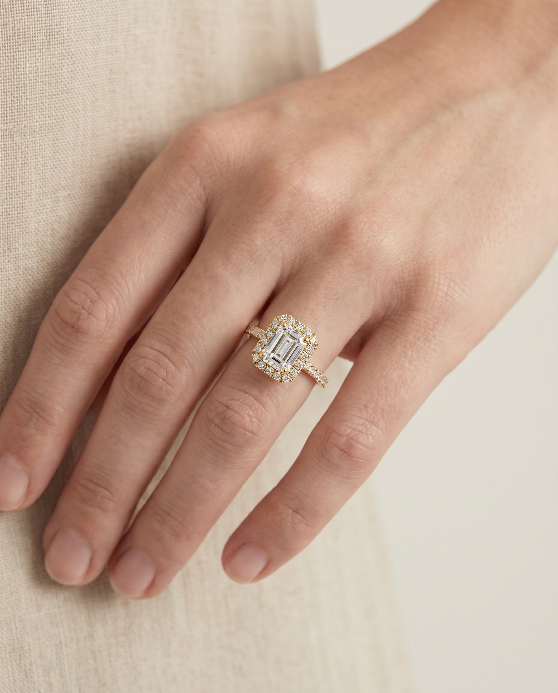 The Dylan engagement ring setting in 18K Yellow Gold, petite french pavé halo cut design | RockHer