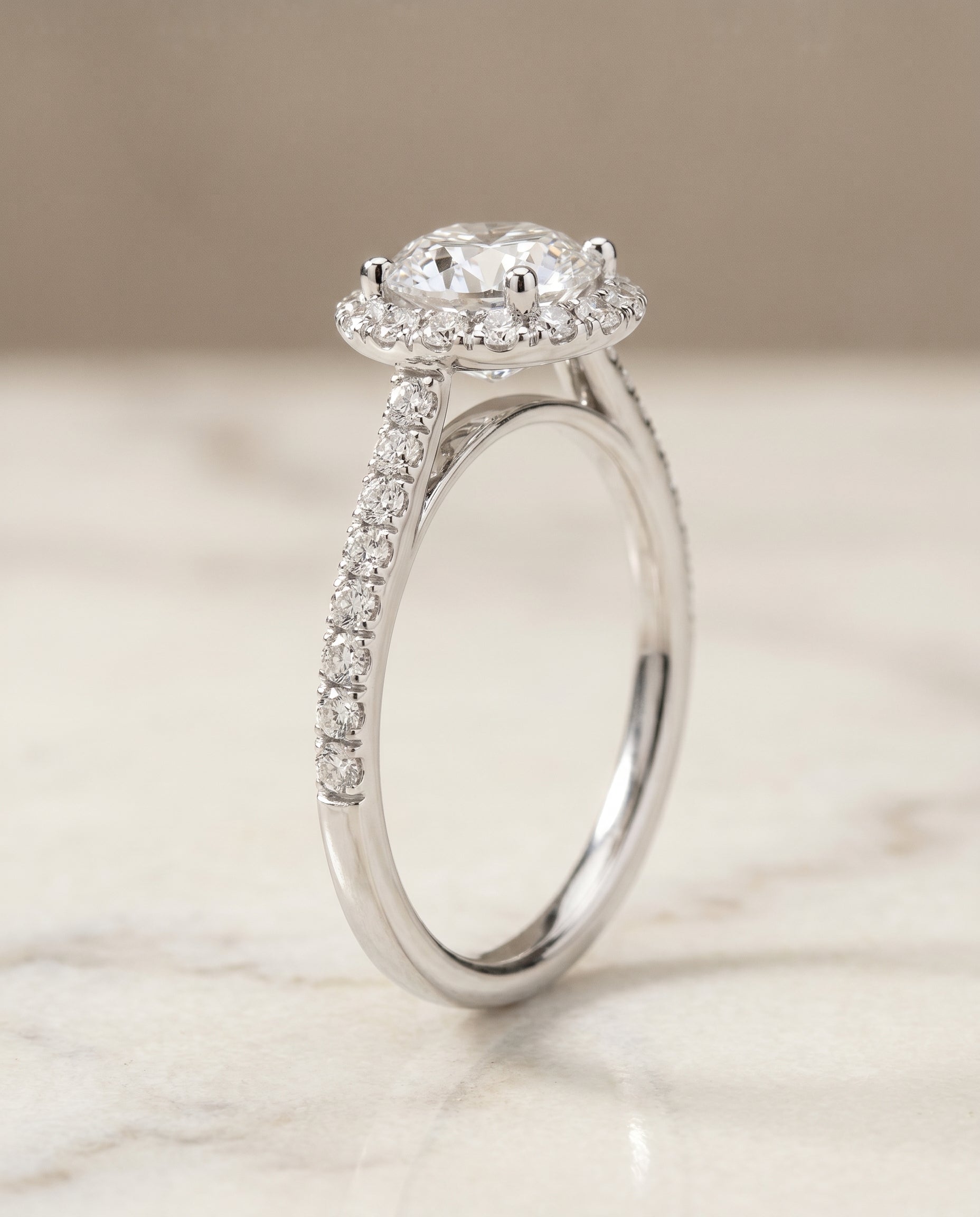 Petite French Pavé Halo styling on The Dylan round engagement ring setting | RockHer