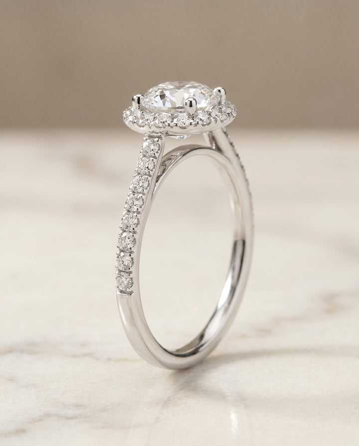 The Dylan Pavé Halo Engagement Ring Setting for Round Diamonds in 18K White Gold