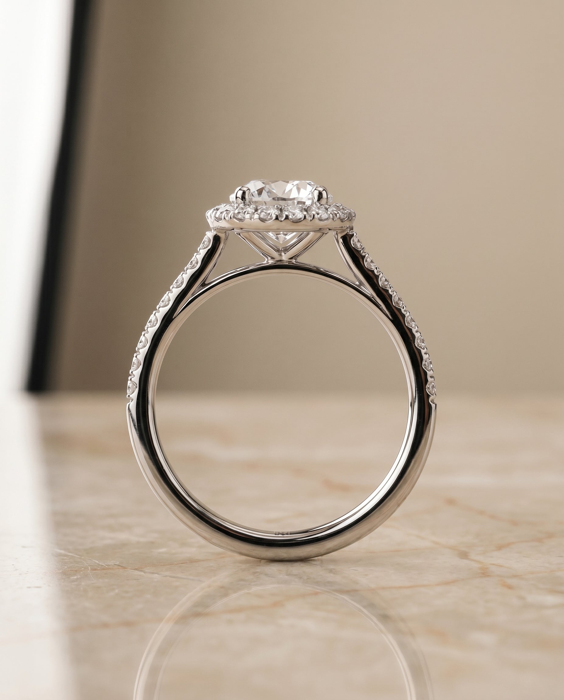The Dylan petite french pavé halo engagement ring setting, shown in Platinum | RockHer