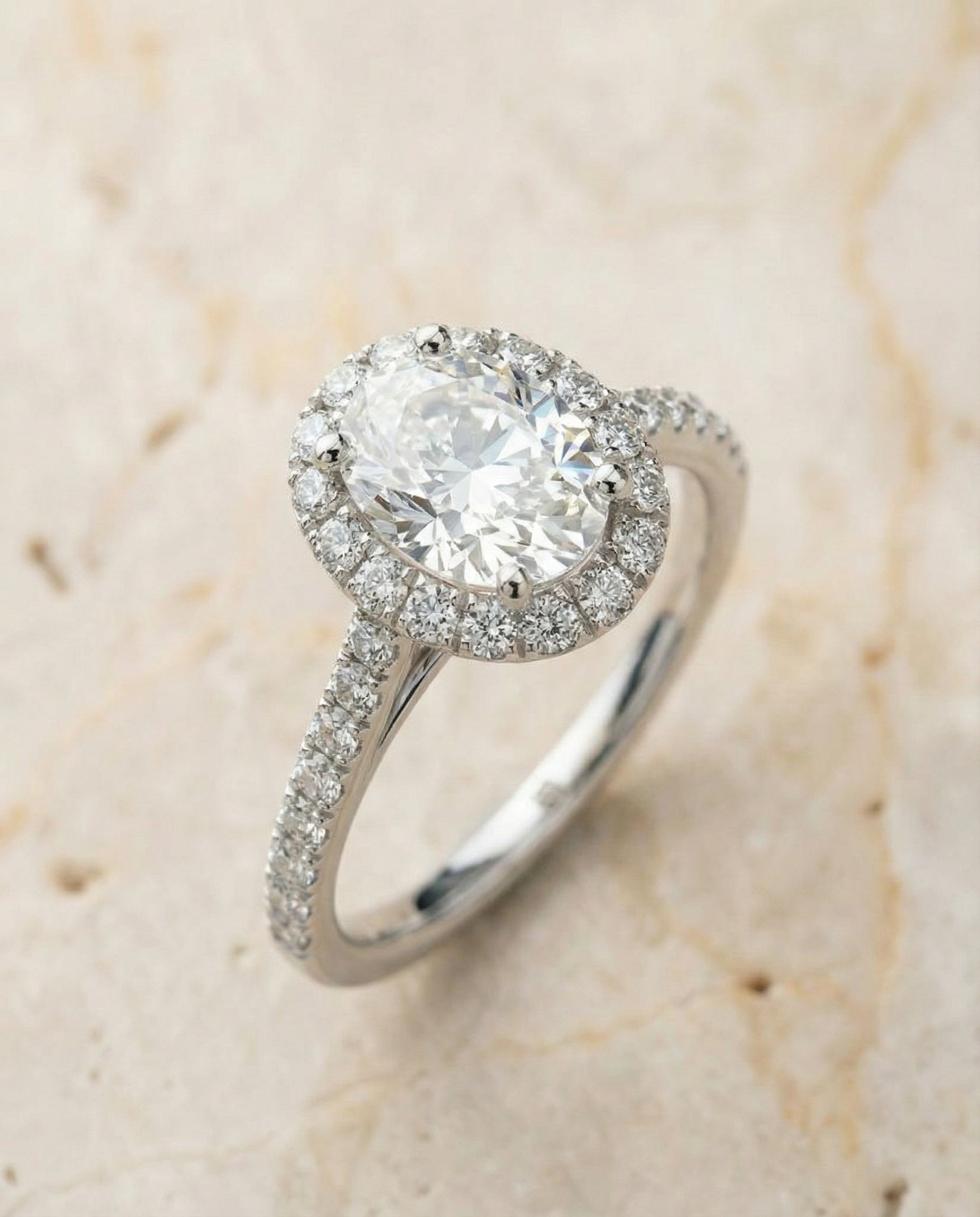 Dylan Select Petite French Pavé Halo Oval Lab Diamond Engagement Ring in 18K White Gold, alternate angle | RockHer