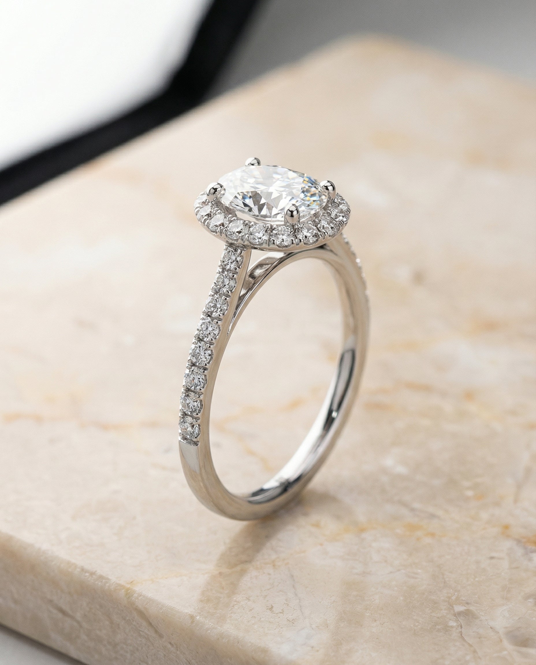 Dylan Select Petite French Pavé Halo Oval Lab Diamond Engagement Ring in Platinum, front view | RockHer
