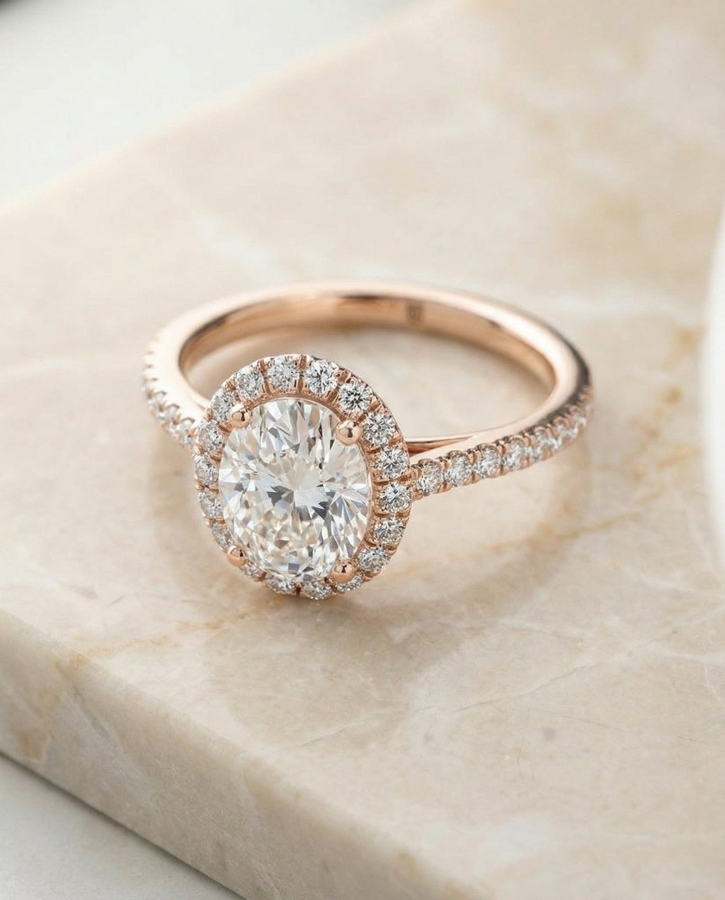 Dylan Select Petite French Pavé Halo Oval Lab Diamond Engagement Ring in 14K Rose Gold, alternate angle | RockHer