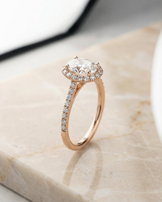 Dylan Select petite french pavé halo oval ring in 14K Rose Gold — front — RockHer