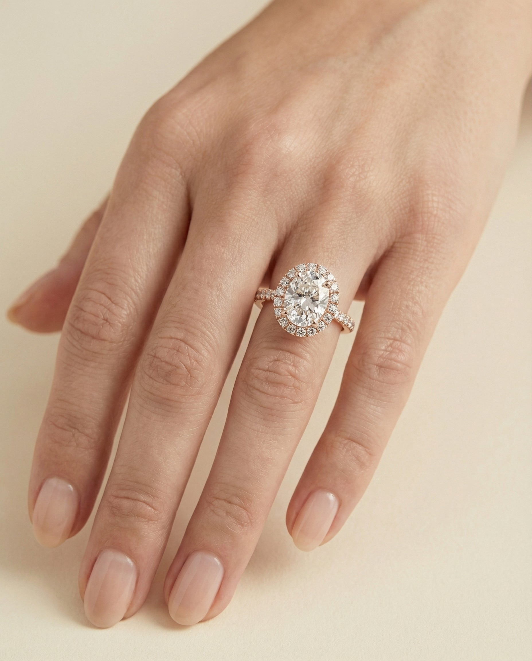 The Dylan engagement ring setting in 14K Rose Gold, petite french pavé halo design | RockHer