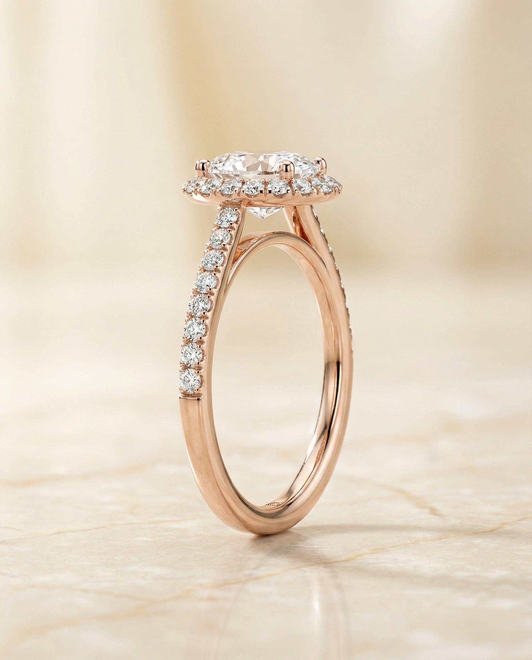 The Dylan petite french pavé halo engagement ring setting, shown in 14K Rose Gold | RockHer