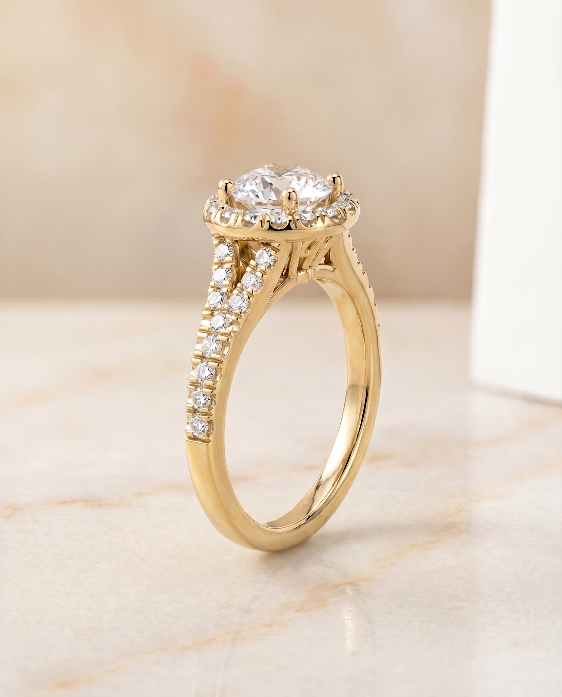 Petite Split Shank Halo styling on The Calliope round engagement ring setting | RockHer
