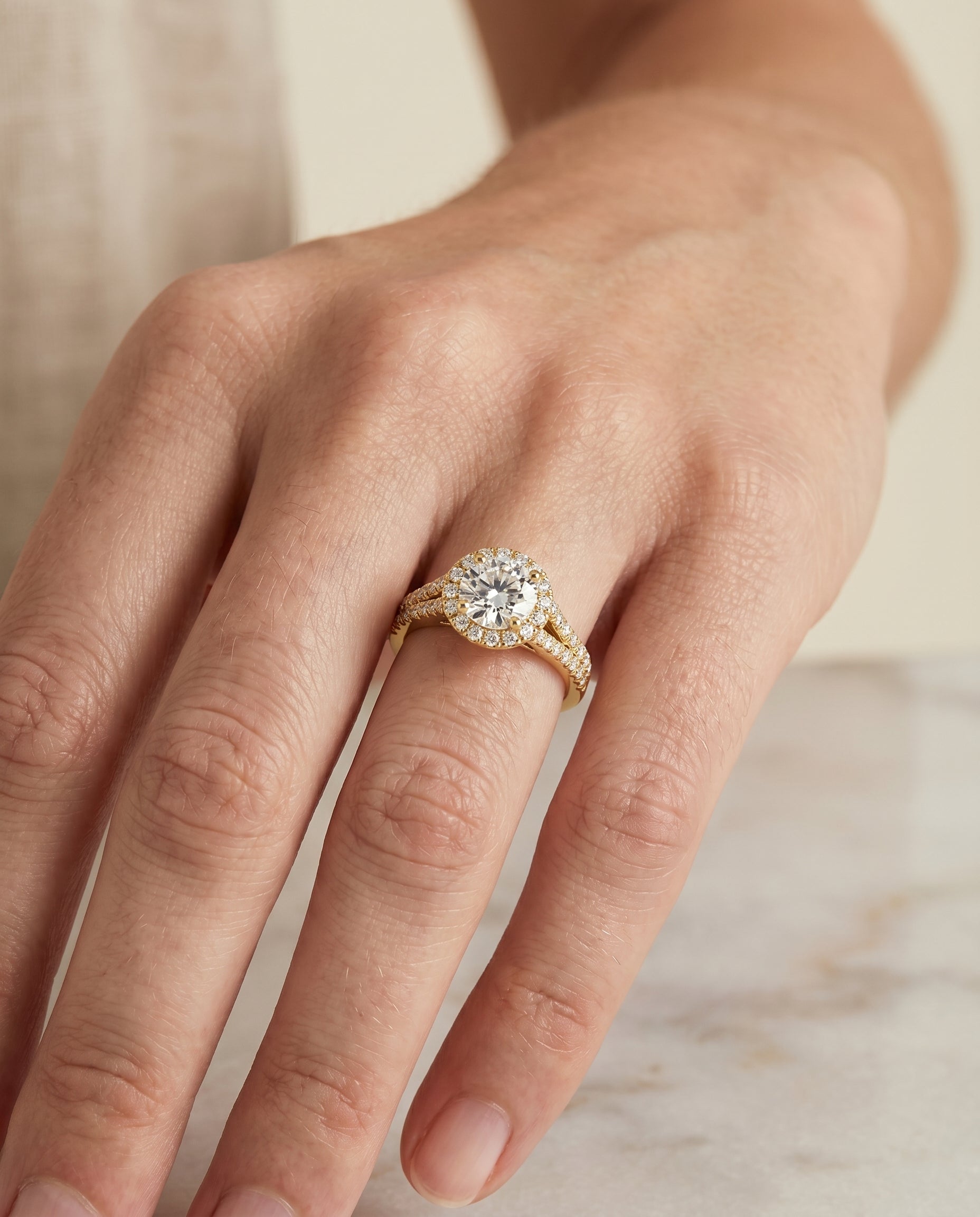 The Calliope setting for round diamonds, made to order in 18K Yellow Gold | RockHer
