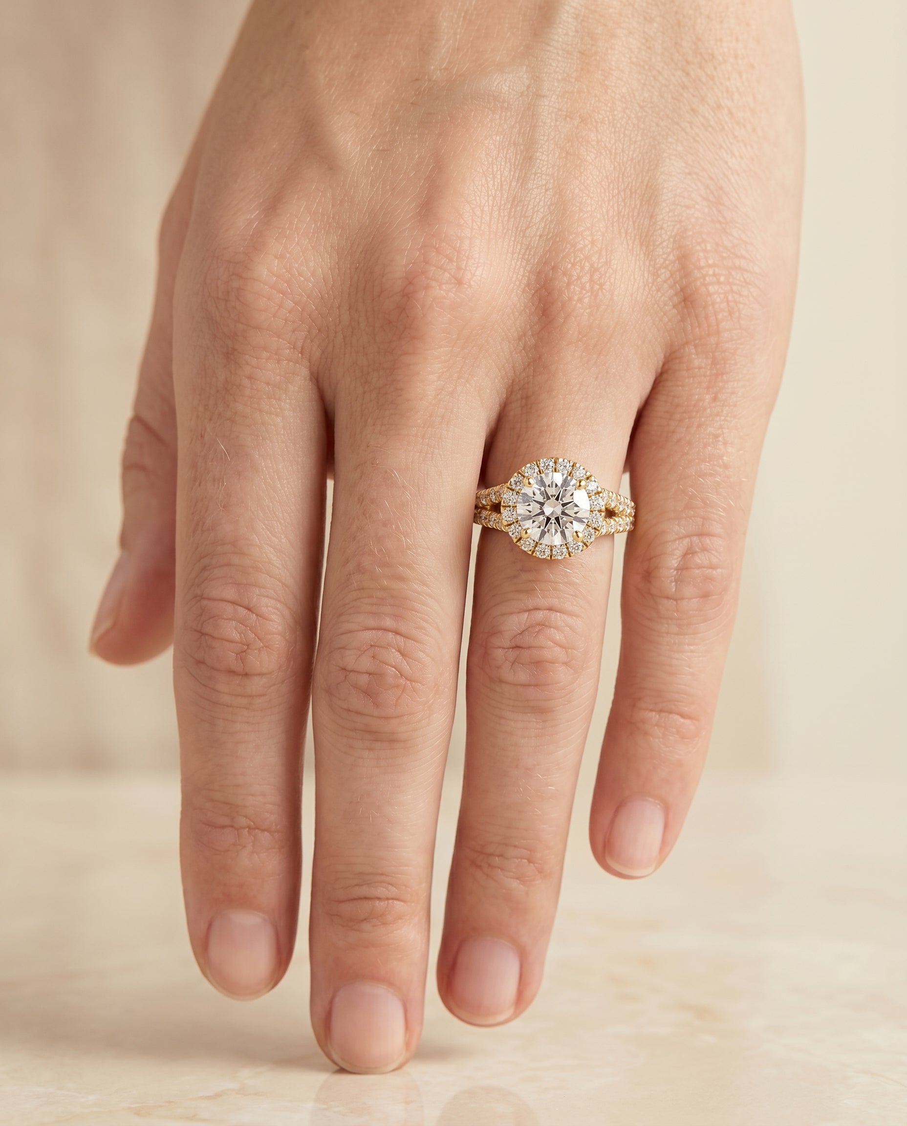 The Calliope engagement ring setting in 18K Yellow Gold, petite split shank halo design | RockHer