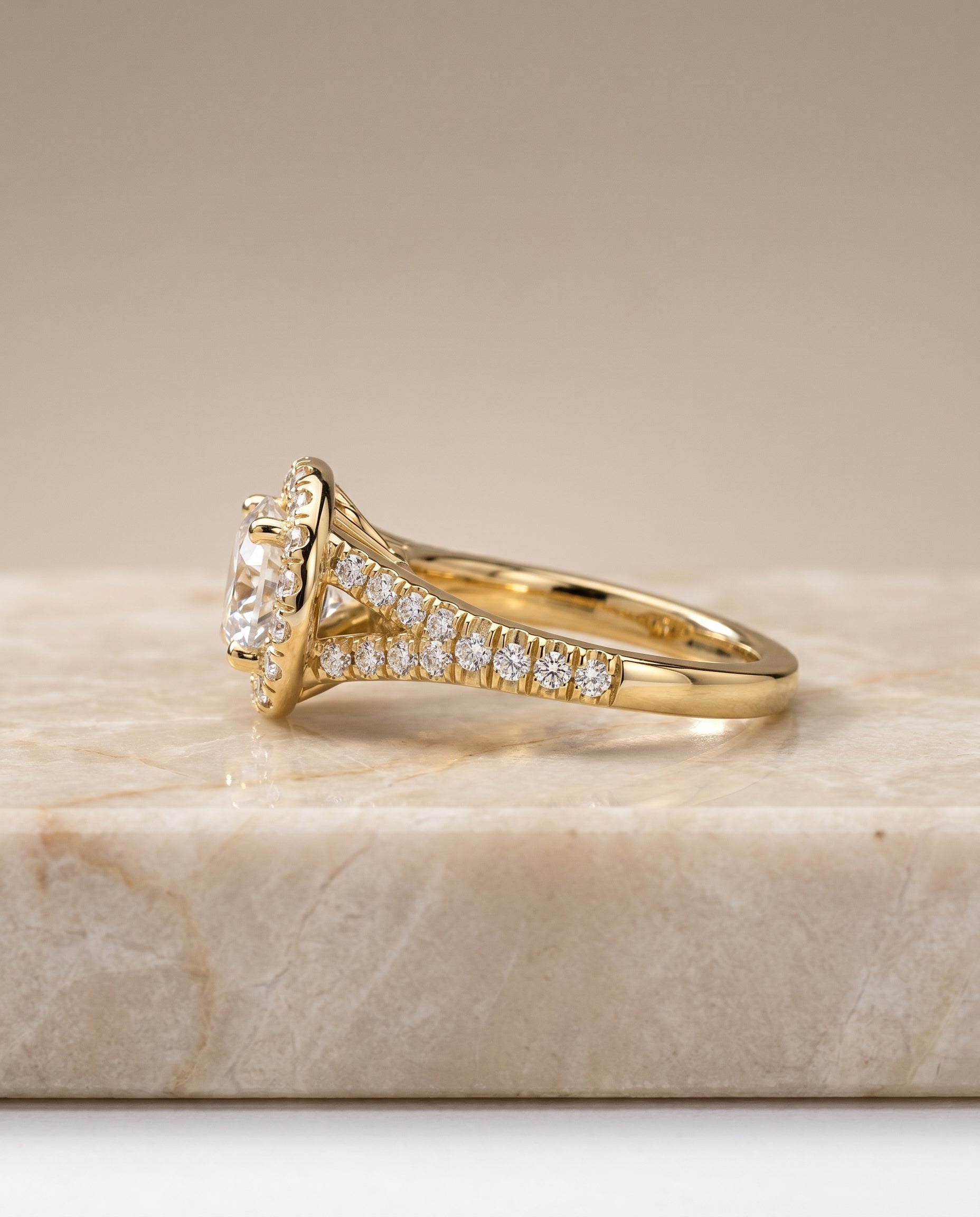 The Calliope petite split shank halo engagement ring setting, shown in 18K Yellow Gold | RockHer