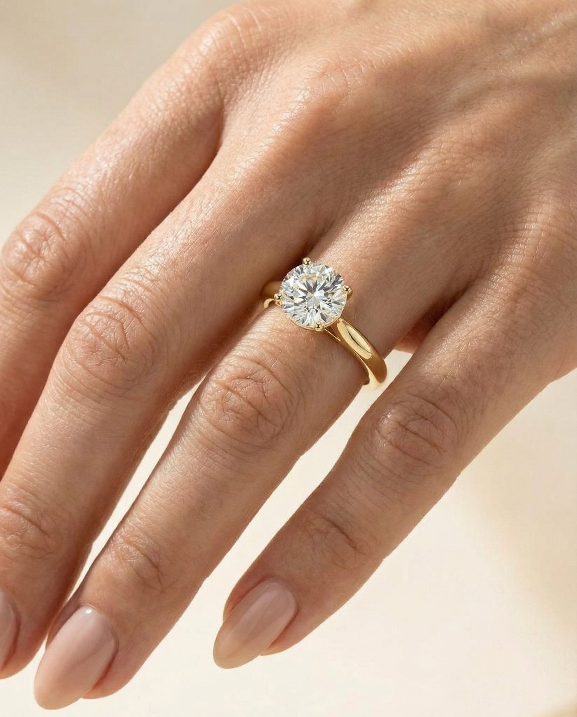 The Gladys engagement ring setting in 18K Yellow Gold, select pinched cathedral solitaire design | RockHer