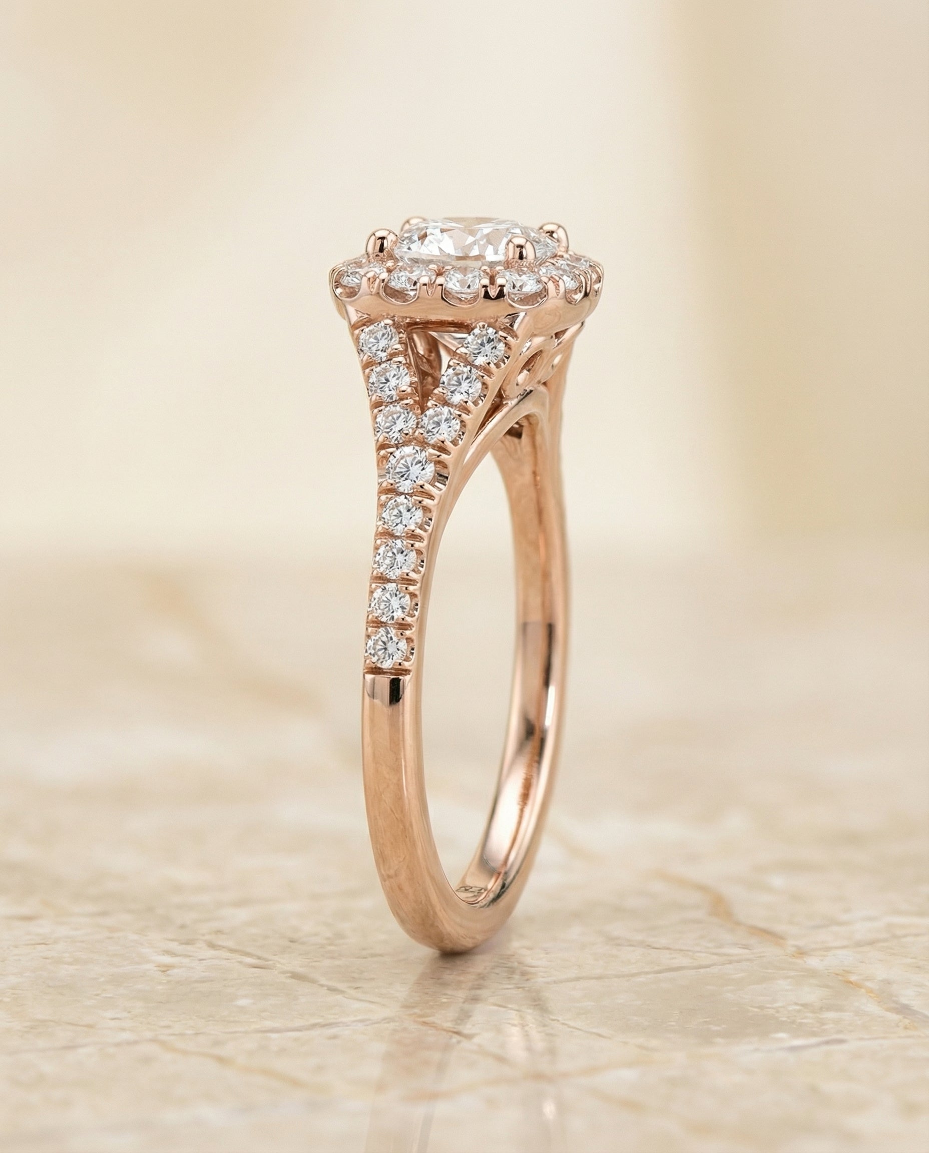 The Billie prong halo split shank cut engagement ring setting, shown in 14K Rose Gold | RockHer