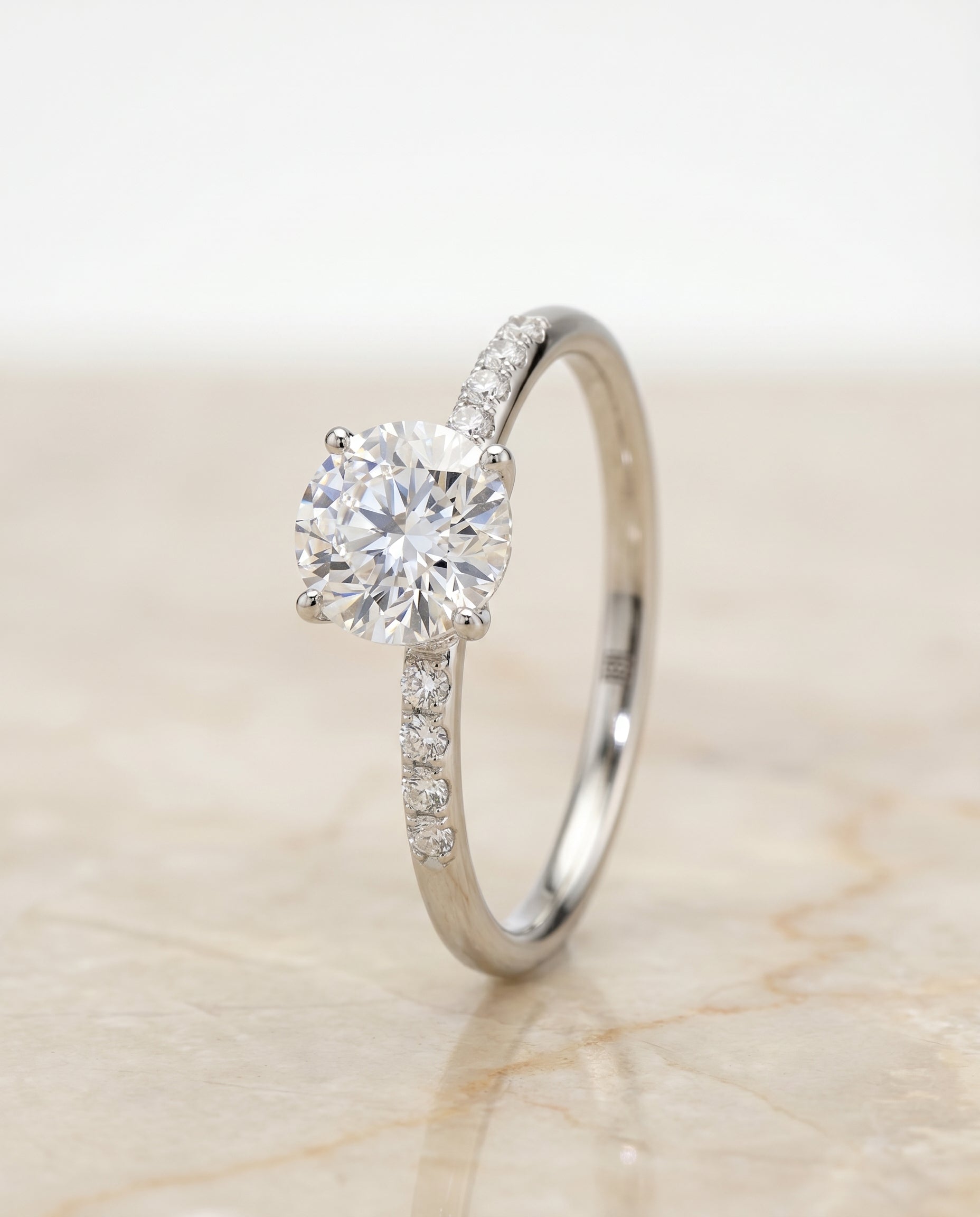 Hidden Halo Pavé Solitaire styling on The Cherie round engagement ring setting | RockHer
