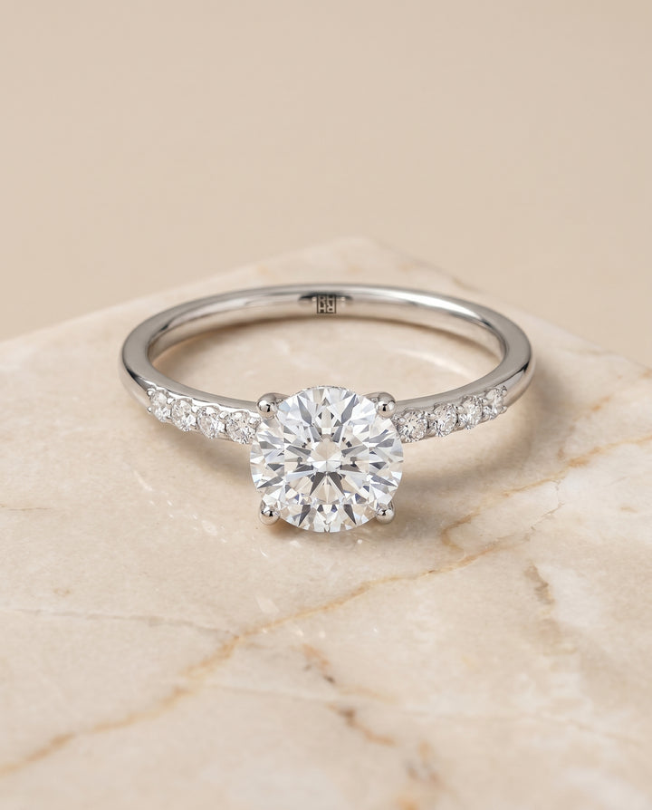 The Cherie Hidden Halo Solitaire Engagement Ring Setting for Round Diamonds in 18K White Gold | RockHer