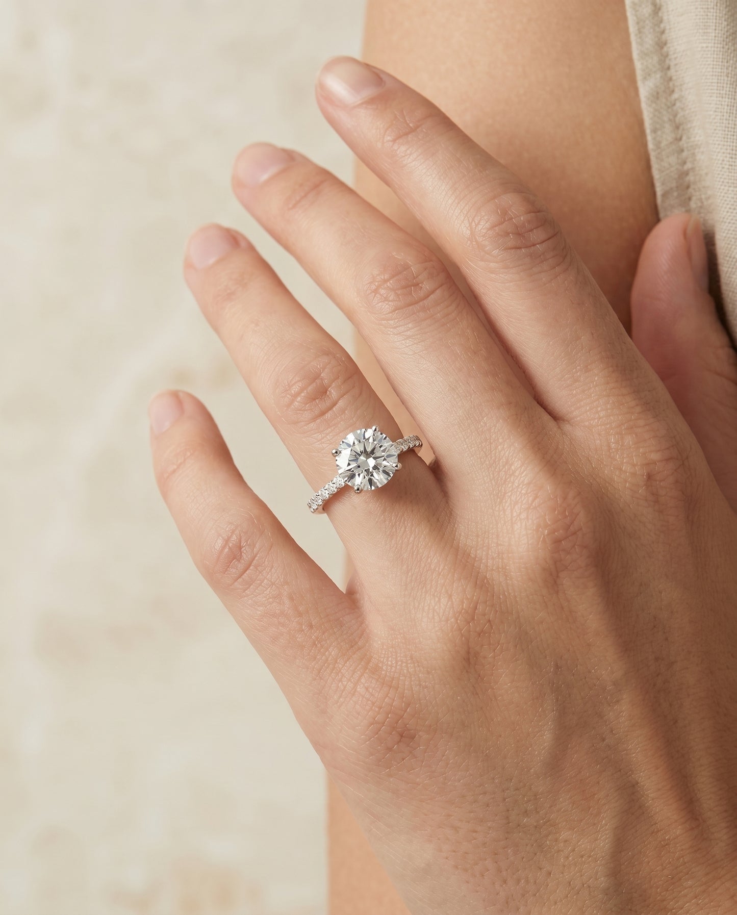 The Cherie Hidden Halo Solitaire Engagement Ring Setting for Round Diamonds in 18K White Gold
