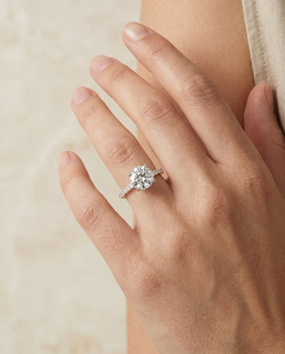 Cherie Select Hidden Halo Pavé Solitaire Round Lab Diamond Engagement Ring in 18K White Gold, shown on hand | RockHer