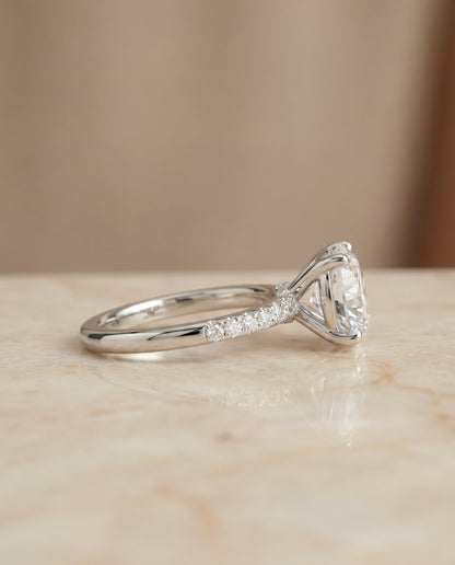Cherie Select Hidden Halo Pavé Solitaire Round Lab Diamond Engagement Ring in Platinum, side view | RockHer