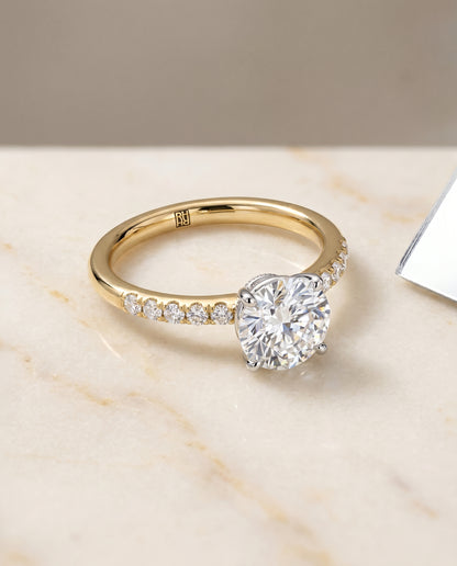 The Cherie Hidden Halo Solitaire Engagement Ring Setting for Round Diamonds in 18K Yellow Gold | RockHer
