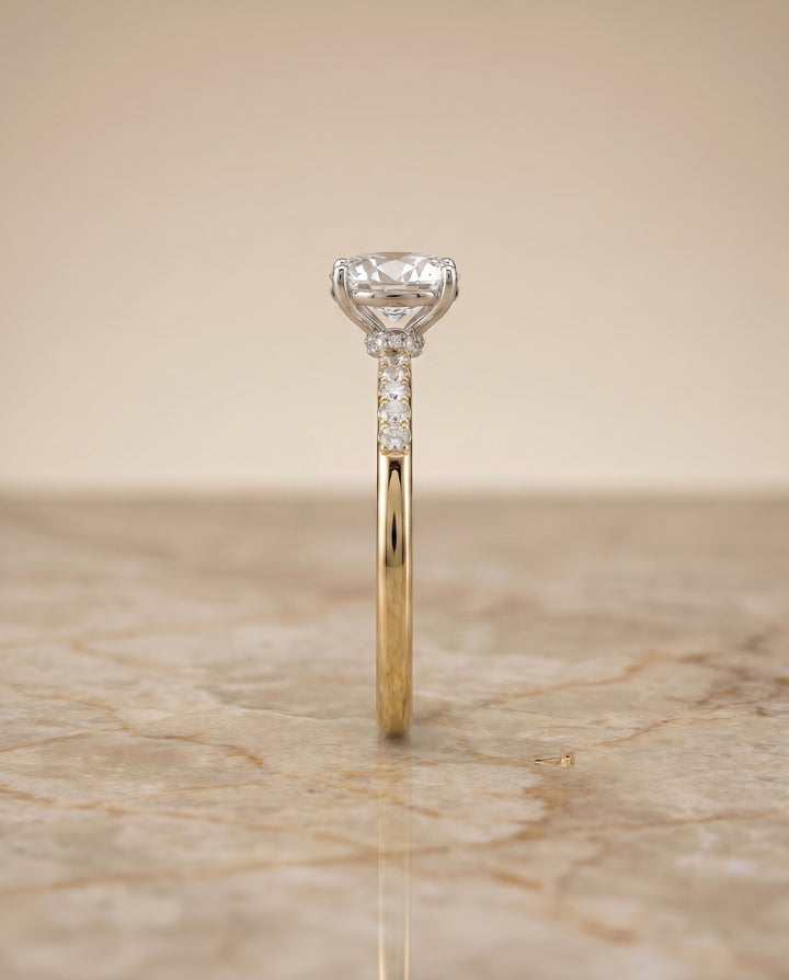The Cherie Hidden Halo Pavé Solitaire Oval Engagement Ring Setting in 18K Yellow Gold