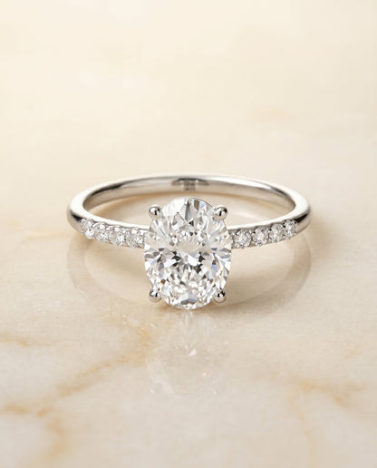 Cherie Select Hidden Halo Pavé Solitaire Oval Lab Diamond Engagement Ring in Platinum, alternate angle | RockHer