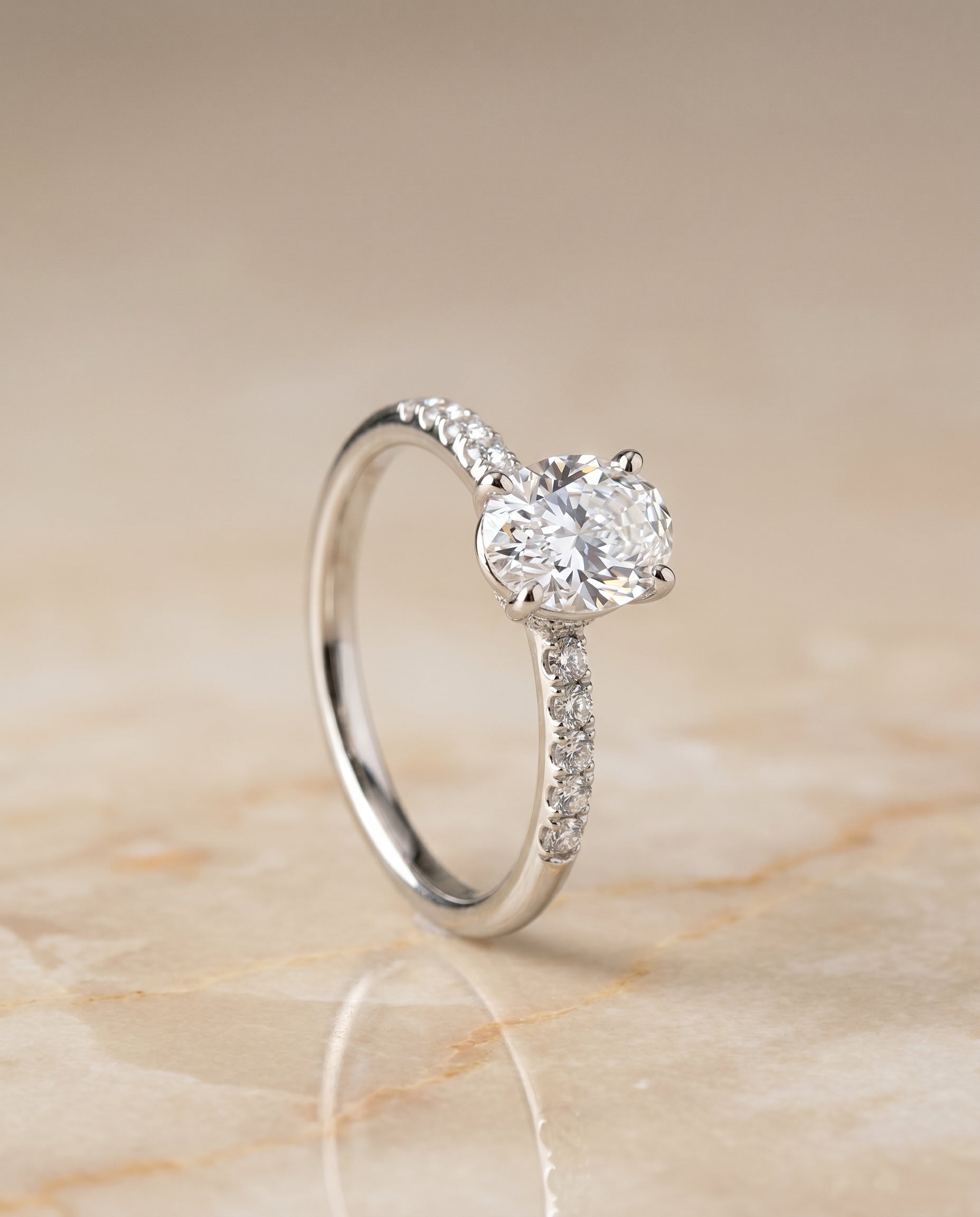 Hidden Halo Pavé Solitaire styling on The Cherie oval engagement ring setting | RockHer