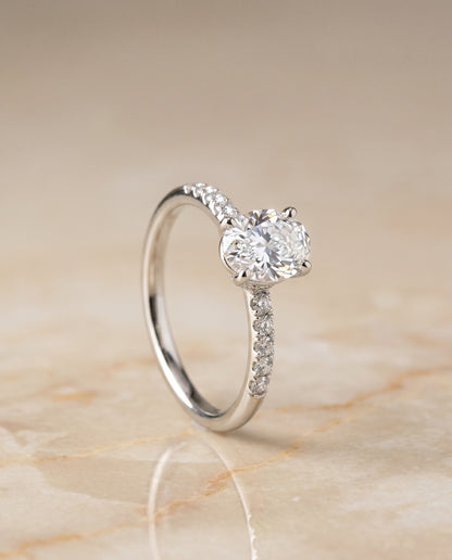 The Cherie Hidden Halo Pavé Solitaire Oval Engagement Ring Setting in Platinum