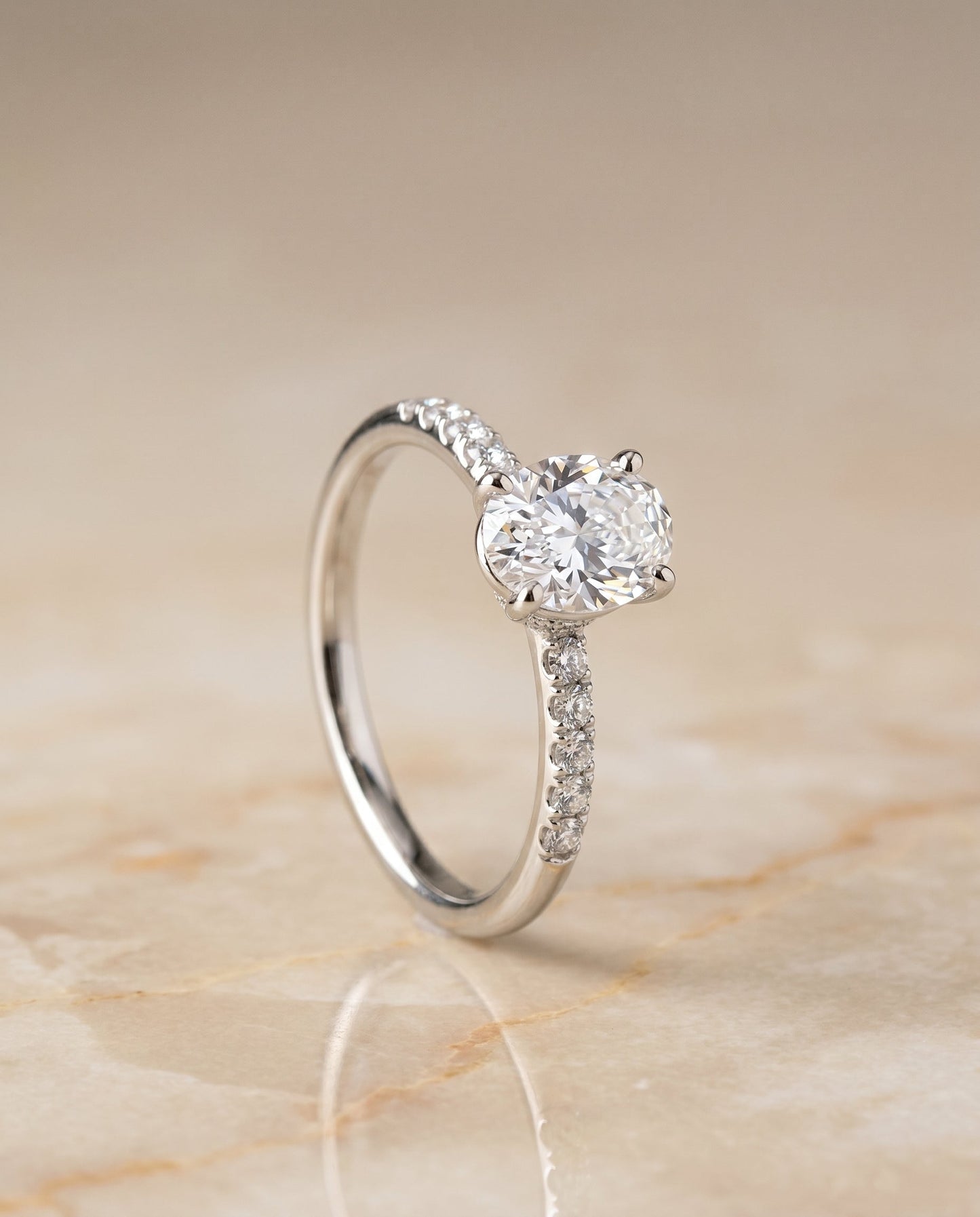 Cherie Select Hidden Halo Pavé Solitaire Oval Lab Diamond Engagement Ring in 18K White Gold, front view | RockHer