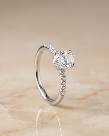 Cherie Select Hidden Halo Pavé Solitaire Oval Lab Diamond Engagement Ring in 18K White Gold, front view | RockHer