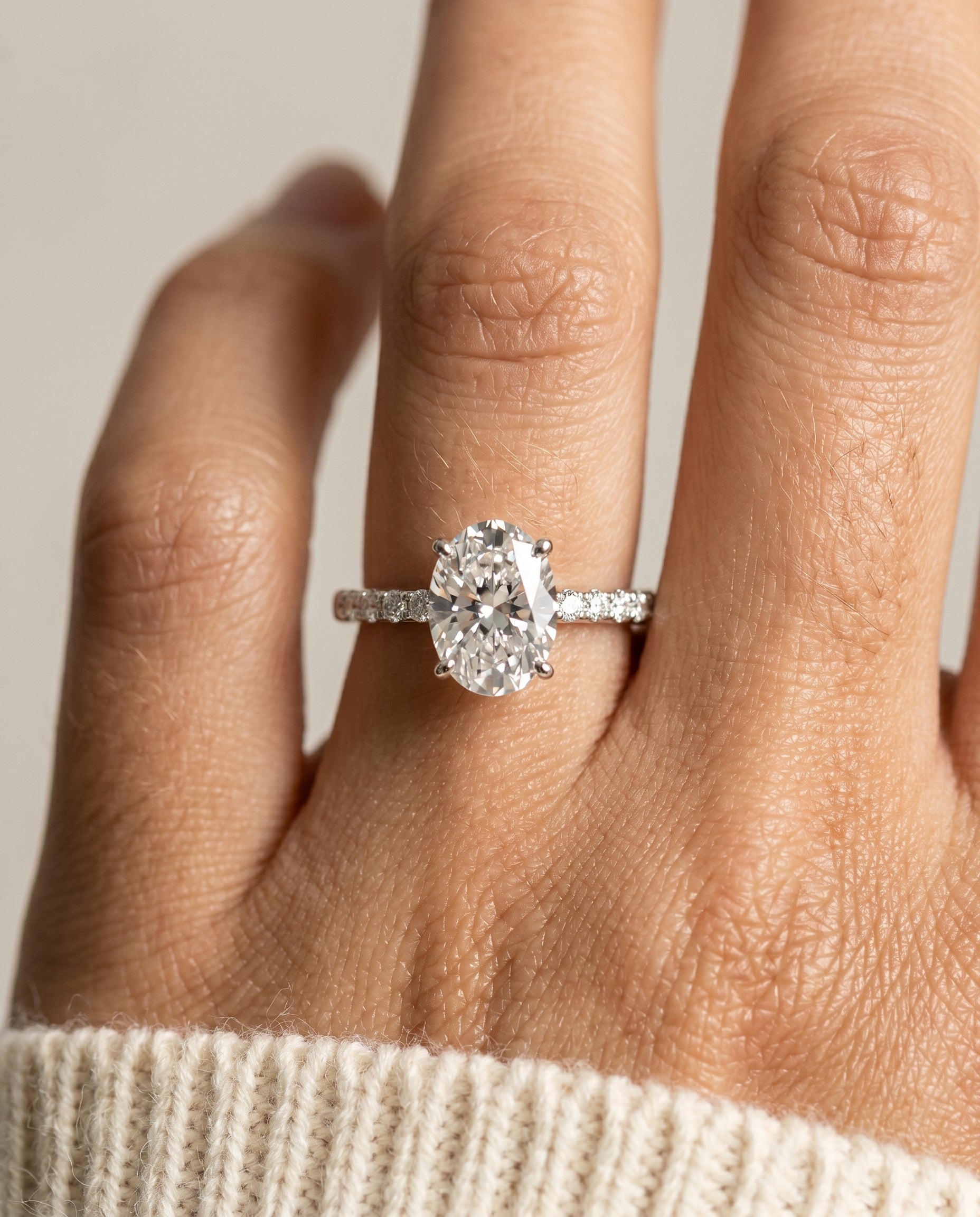 The Cherie engagement ring setting in Platinum, hidden halo pavé solitaire design | RockHer