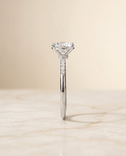 Cherie Select Hidden Halo Pavé Solitaire Oval Lab Diamond Engagement Ring in 18K White Gold, side view | RockHer