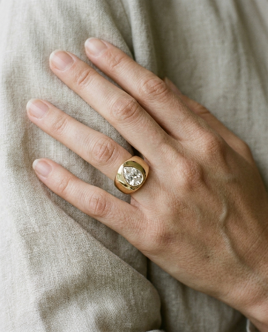 The Remi engagement ring setting in 18K Yellow Gold, bezel set cigar band briolette design | RockHer
