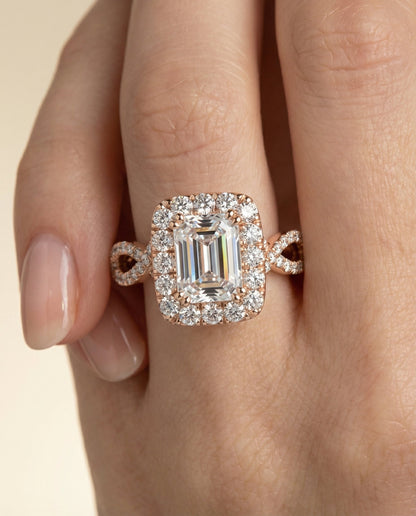 Annie Select ribbon twist pavé halo emerald cut emerald cut ring in 14K Rose Gold — front — RockHer