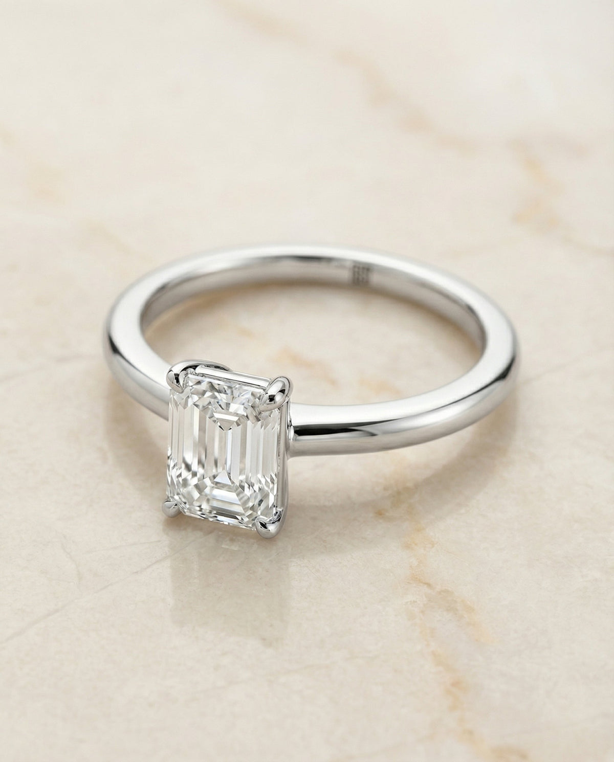 Floria Select Comfort Fit Claw Prong Solitaire Emerald Cut Lab Diamond Engagement Ring in Platinum, alternate angle | RockHer