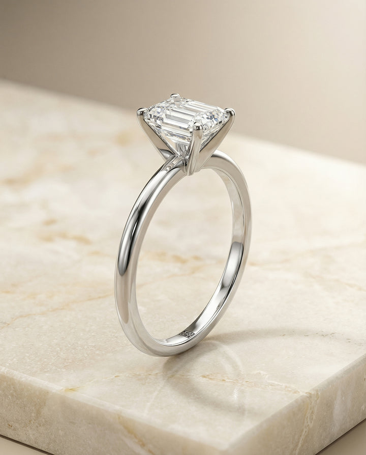 European Cut, Round Comfort Fit Claw Prong Solitaire Emerald, in Platinum – front view | RockHer